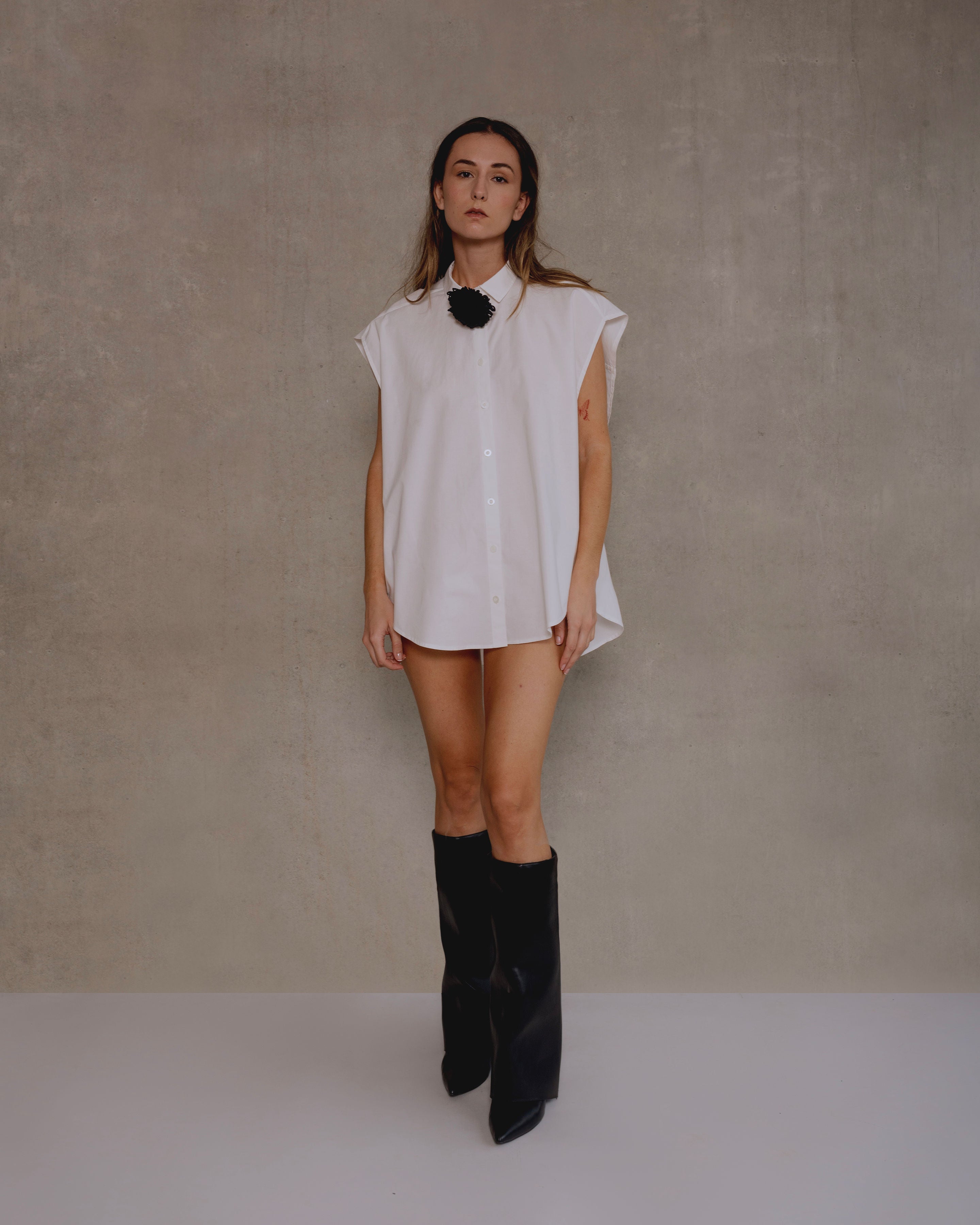 camisa sin mangas con sisa caida