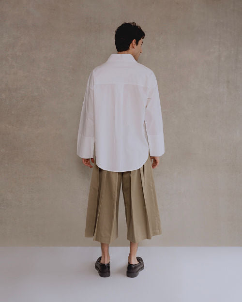 camisa blanca asimetrica con botones